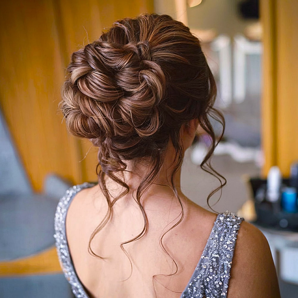 Elegant Updo With Sculpted Curls and Soft Tendrils Elegant Updo With Sculpted Curls and Soft Tendrils — Prom Hairstyles 2027 with Weave
