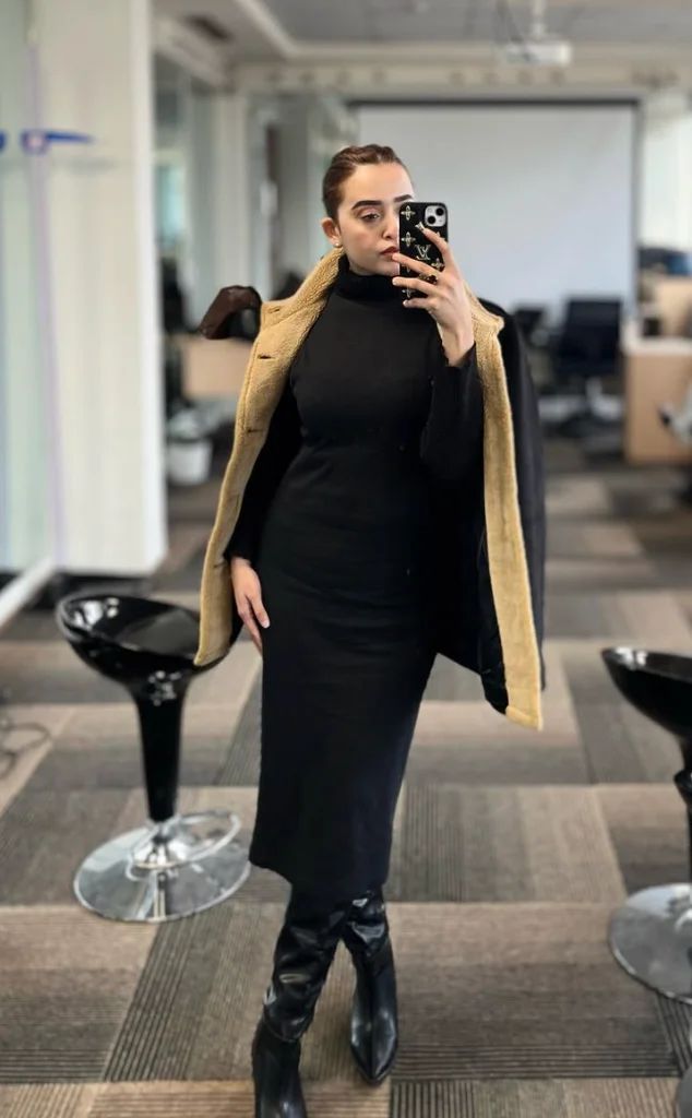 Beige Teddy Coat Over Black Turtleneck Dress Beige Teddy Coat Over Black Turtleneck Dress — Winter Dinner Outfits 2027