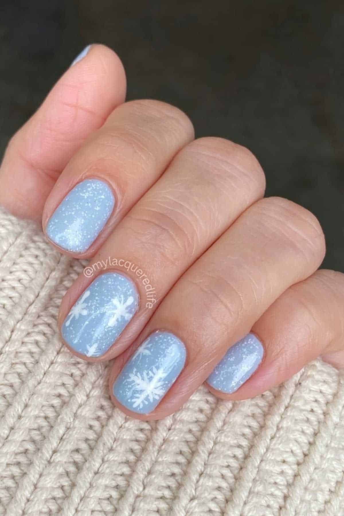 Glossy With Subtle Shimmer Light Blue Scattered Snowflake Glossy With Subtle Shimmer Light Blue Scattered Snowflake — Snowflake Nails 2027