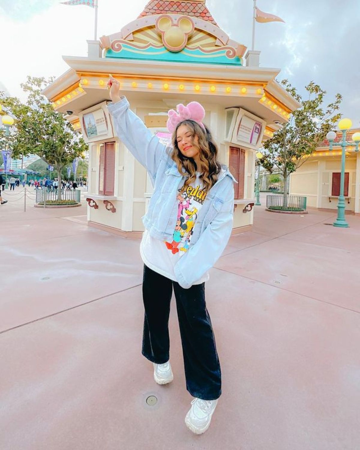 Casual Denim and Graphic Tee with Pink Ears — Disney Winter Outfits 2027