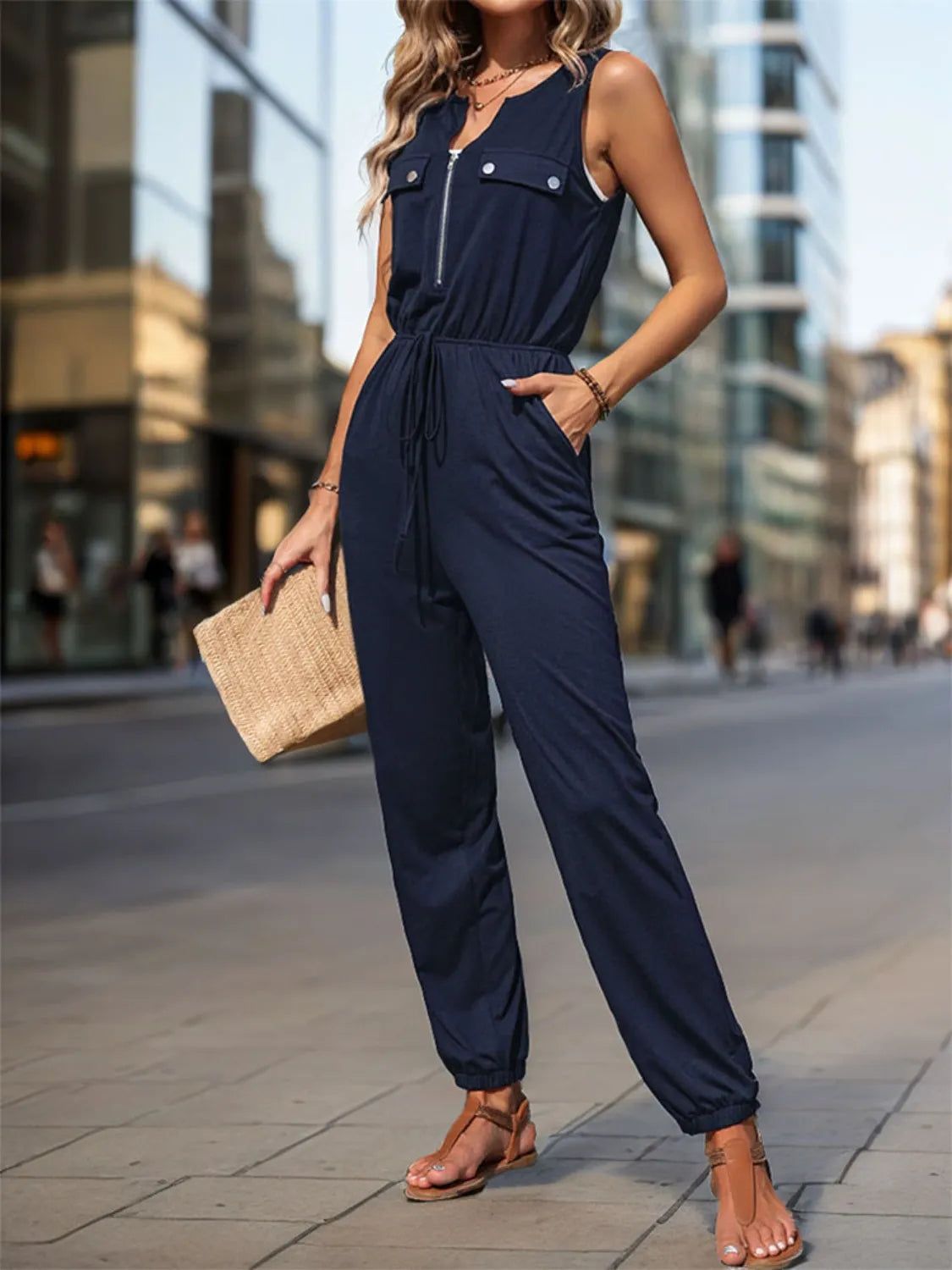 Navy Blue Tapered Leg Jumpsuit with Zip and Drawstring Waist Navy Blue Tapered Leg Jumpsuit with Zip and Drawstring Waist — Sleeveless Jumpsuit Outfits 2027