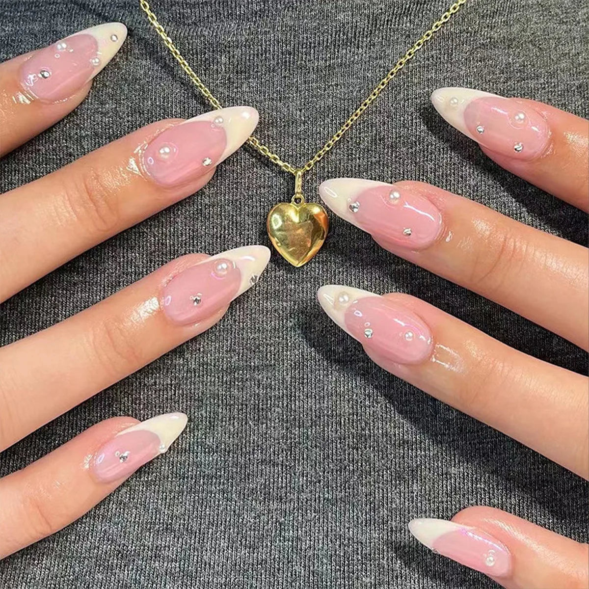 Sheer Pink French with Pearl and Rhinestone Accents Sheer Pink French with Pearl and Rhinestone Accents — Long Almond Nails 2027
