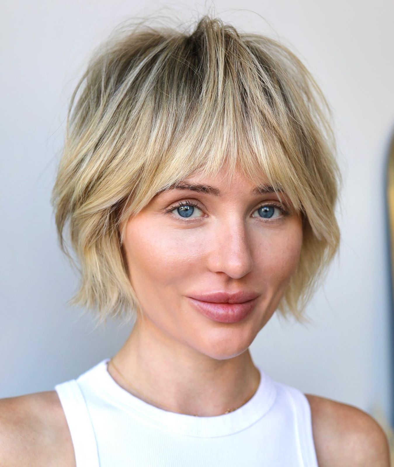 Short Ash Blonde Shag with Choppy Bangs — Low Maintenance Haircuts 2027