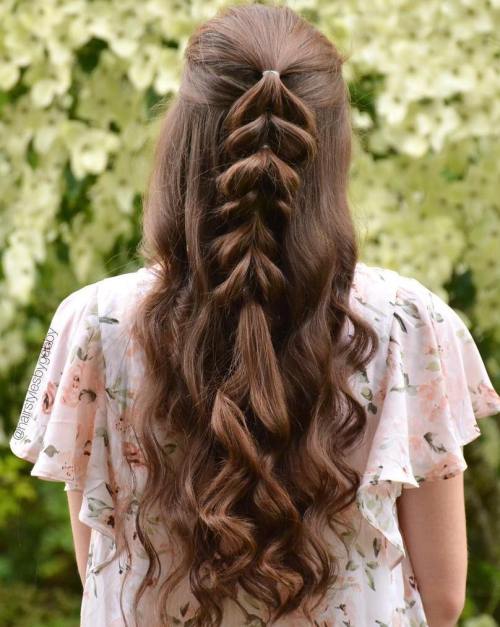 Messy Low Bun with Side-Swept Bangs Messy Low Bun with Side-Swept Bangs — Game Day Hairstyles 2026