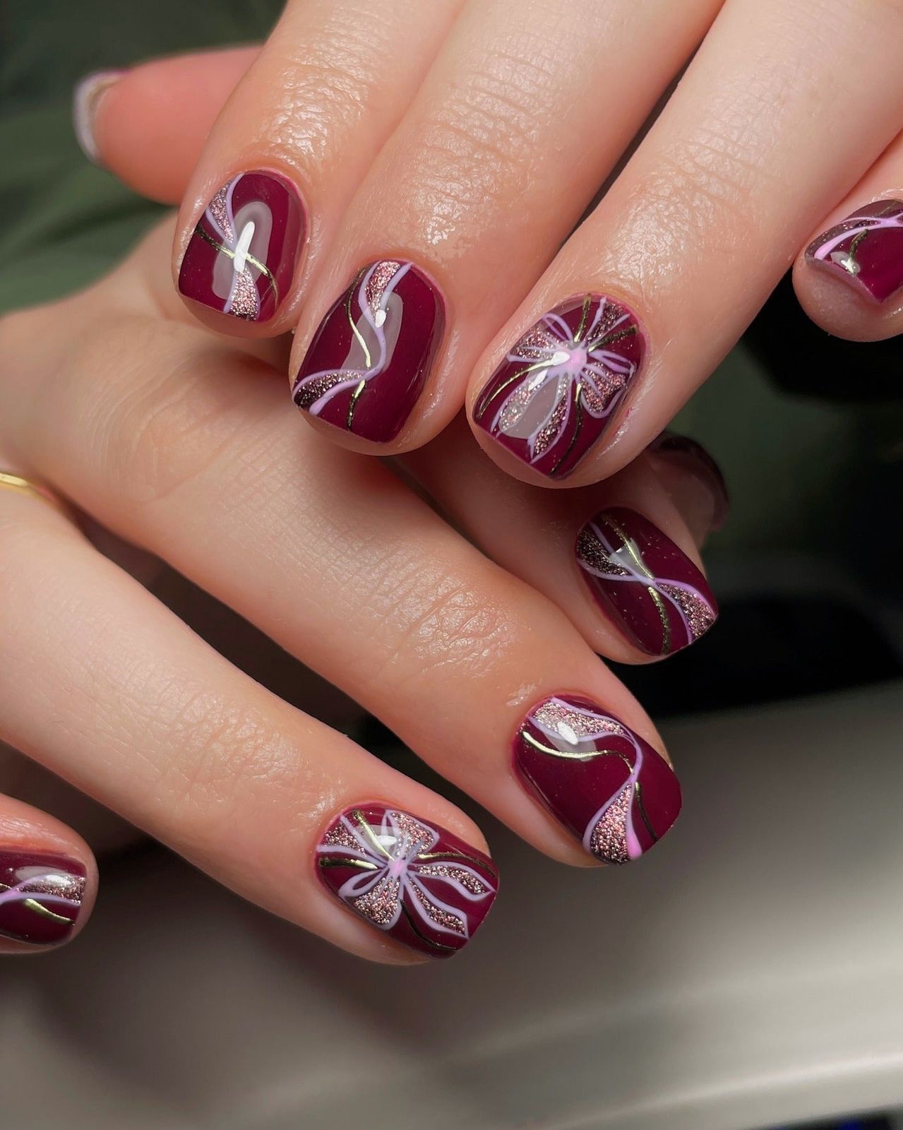 Berry Bows With Glitter Accents — Burgundy Nails 2027
