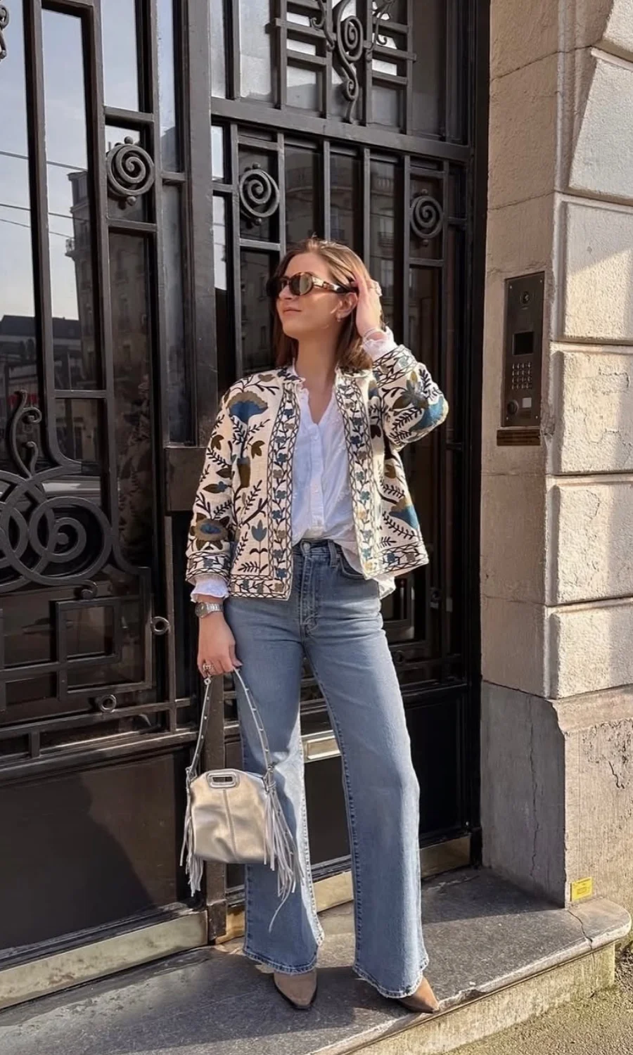 Bohemian Flair: Flared Jeans with Embroidered Jacket Bohemian Flair: Flared Jeans with Embroidered Jacket — Jeans Outfits 2027