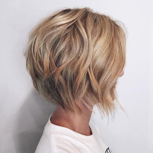 Ear-Length Blonde Shag With Choppy Layers Ear-Length Blonde Shag With Choppy Layers — Short Shag 2027