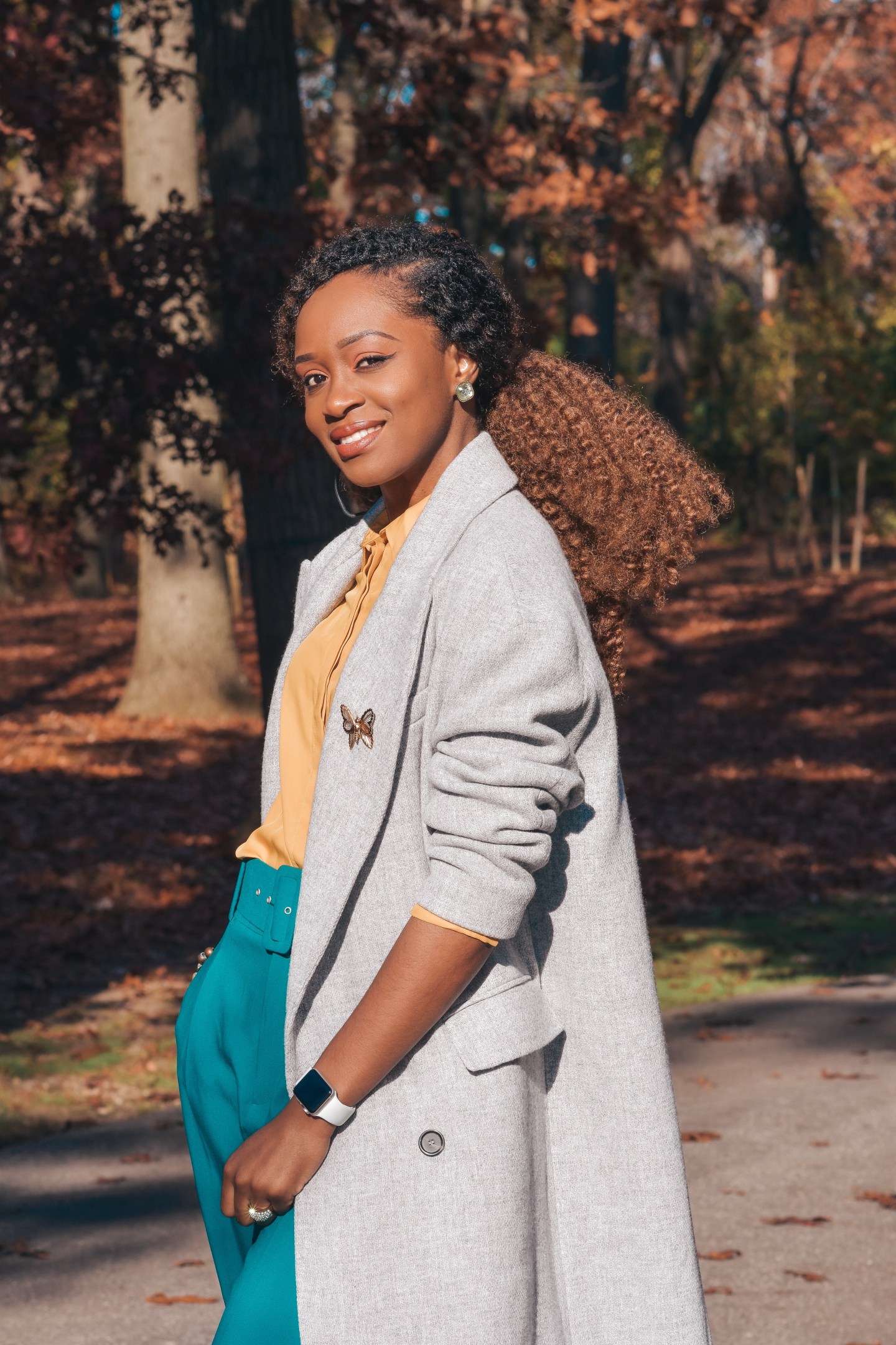 Polished Layers: Grey Coat, Yellow Shirt, and Teal Trousers — Mothers Day Brunch Outfits 2027