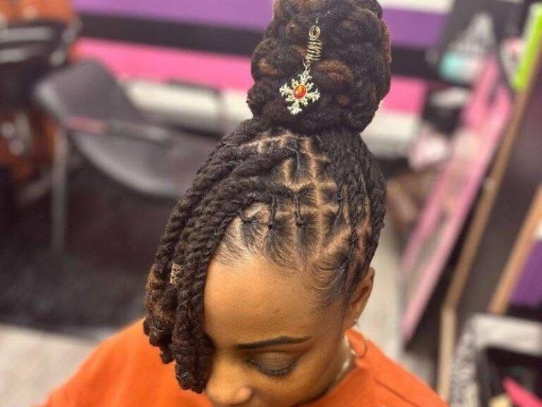 Locs In A High Bun With Accessory Locs In A High Bun With Accessory — Protective Vacation Hairstyles 2027