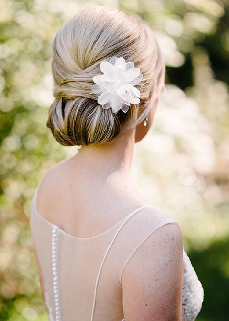 Smooth Low Bun With Fabric Flower — Wedding Updos 2027