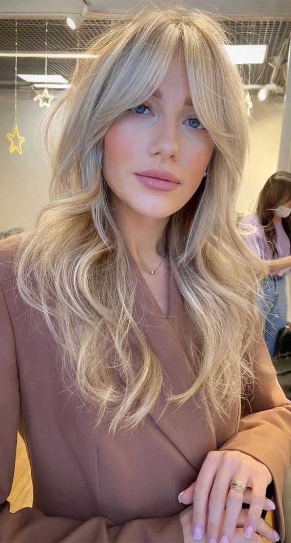 Beige Blonde Layers With Curtain Bangs Beige Blonde Layers With Curtain Bangs — Bangs 2027 for Women Over 50