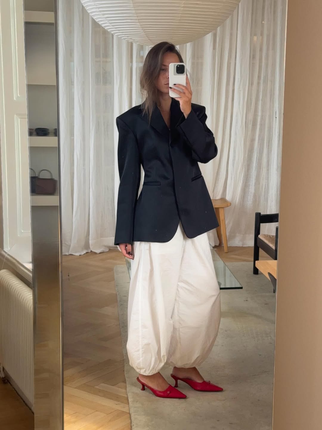 Black Oversized Blazer with Voluminous White Trousers Black Oversized Blazer with Voluminous White Trousers — Scandinavian Outfits 2027