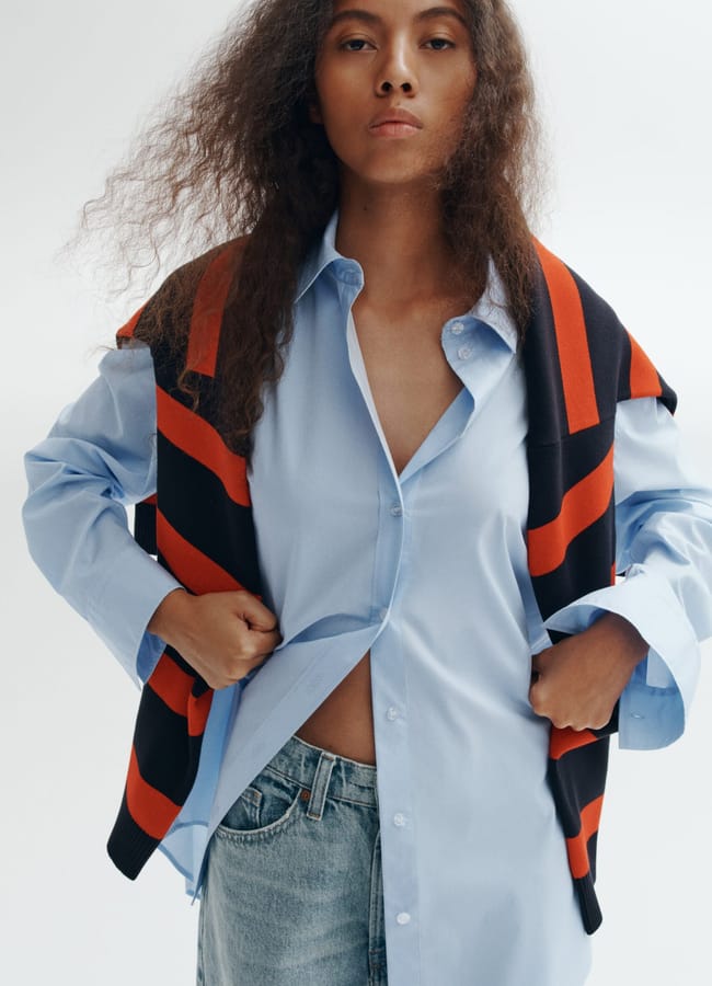 Light Blue Shirt with Draped Sweater and Fitted Jeans — Oversized Shirt Outfits 2027