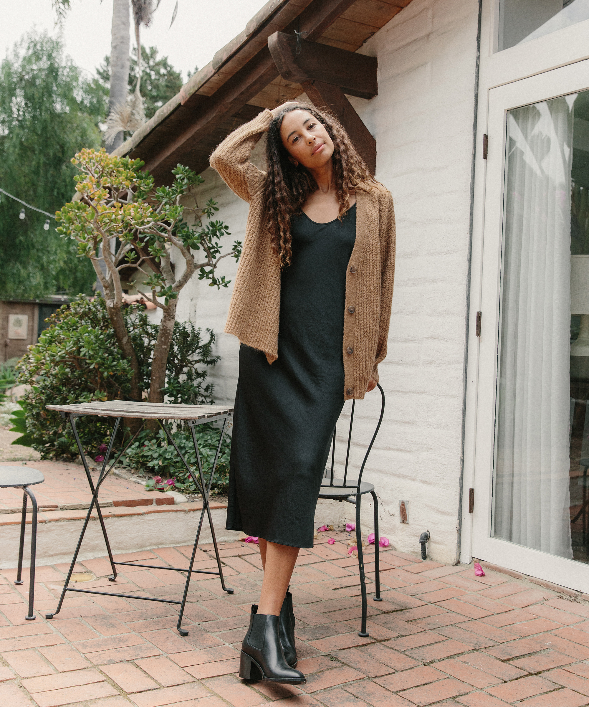 Black Satin Slip Dress with Ribbed Knit Cardigan for Casual Holiday Black Satin Slip Dress with Ribbed Knit Cardigan for Casual Holiday — Holiday Outfits 2026