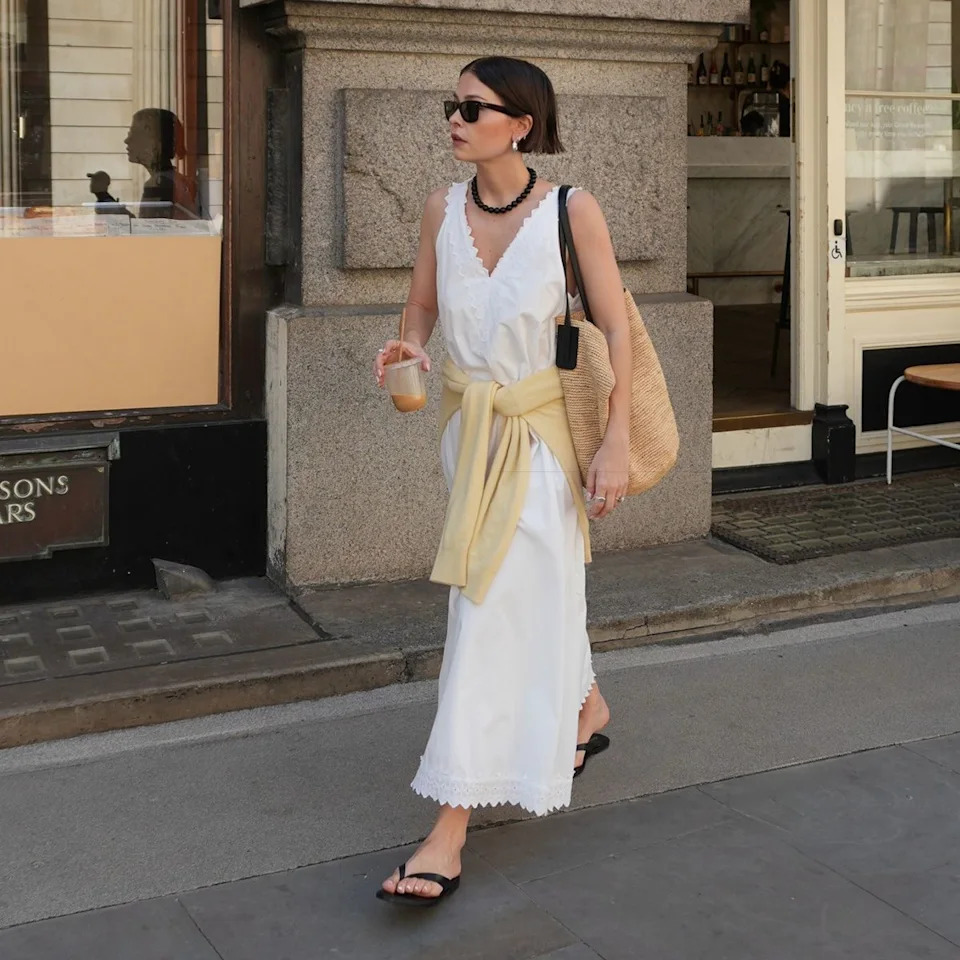 White Lace-Trimmed Midi Dress with Yellow Sweater and Straw Tote White Lace-Trimmed Midi Dress with Yellow Sweater and Straw Tote — Dress 2027 with Sandals Outfit