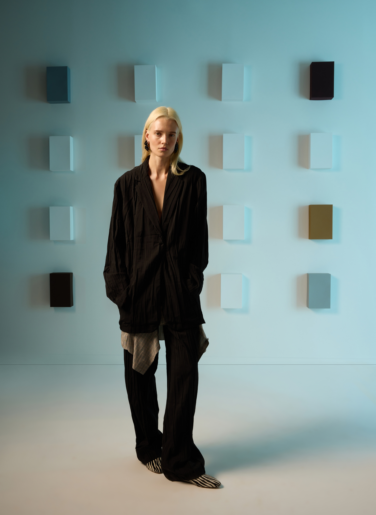 Oversized Black Blazer with Grey Trousers and Statement Heels Oversized Black Blazer with Grey Trousers and Statement Heels — Business Casual Outfits 2027
