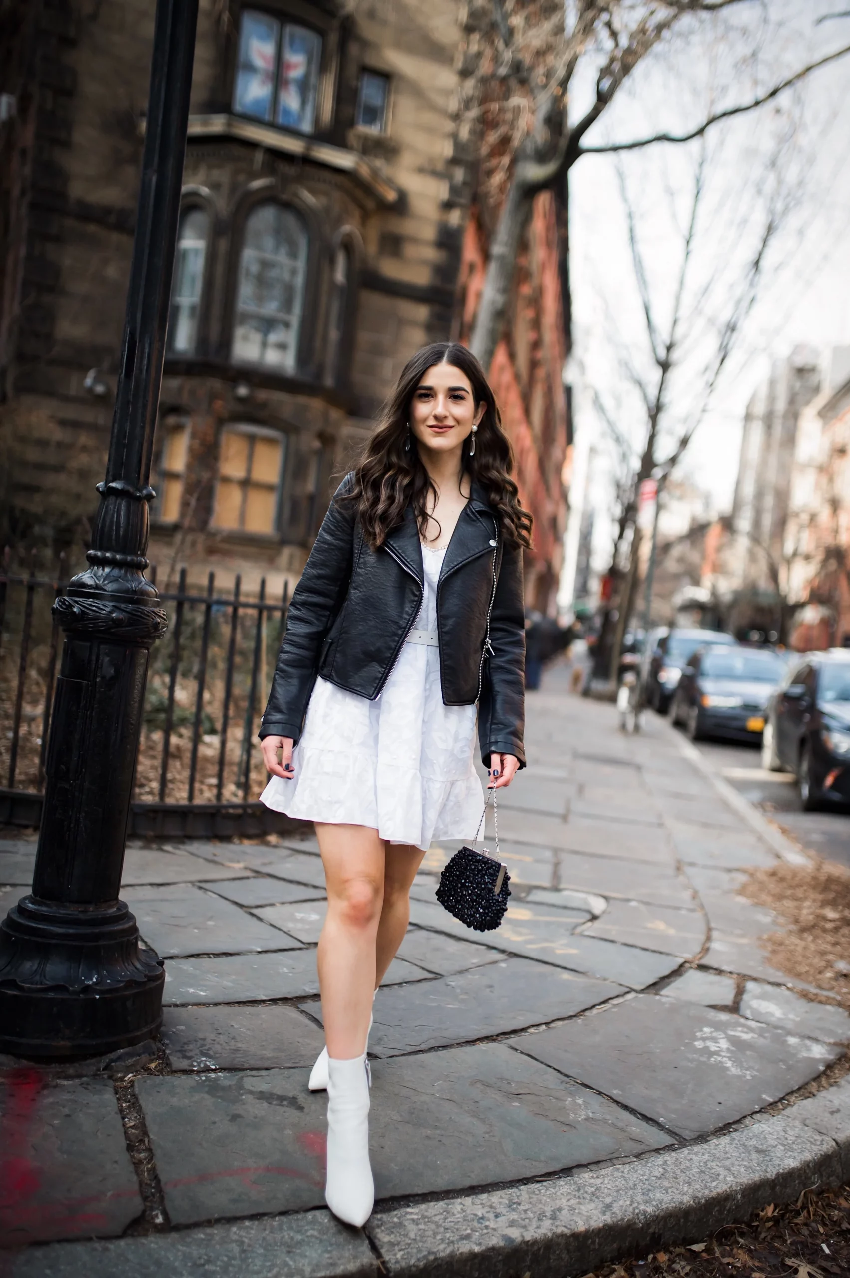 Effortless Casual: Biker Jacket with White A-line Dress and Ankle Boots Effortless Casual: Biker Jacket with White A-line Dress and Ankle Boots — Dress 2027 with Leather Jacket Outfit
