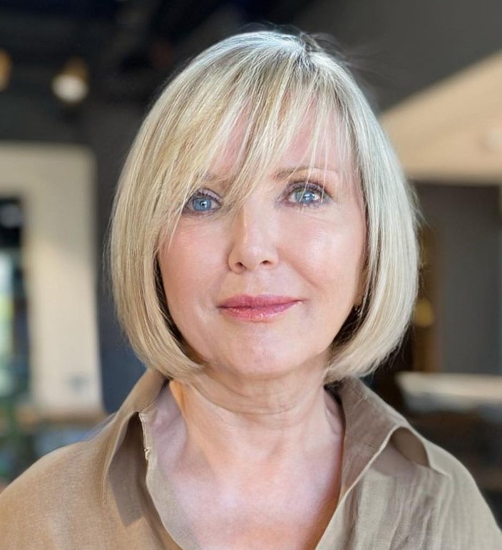 Ash Blonde Bob With Side-Swept Bangs Ash Blonde Bob With Side-Swept Bangs — Bangs 2027 for Women Over 50