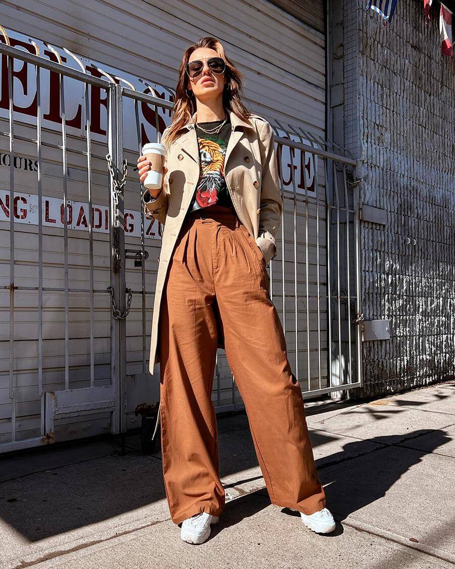 Trench Coat Over Graphic Tee and Wide-Leg Trousers Trench Coat Over Graphic Tee and Wide-Leg Trousers — Sporty Chic Outfits 2027
