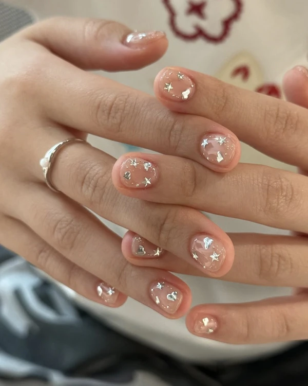 Playful Sheer Pink Nails with Charms Playful Sheer Pink Nails with Charms — Gel X Nails 2027