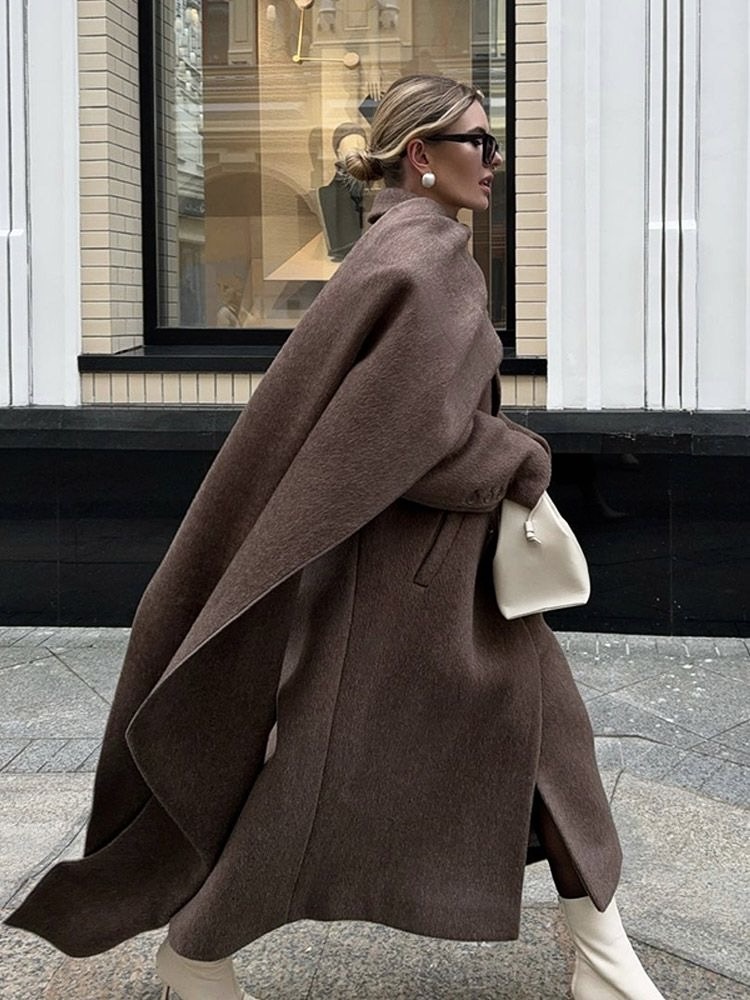 Dramatic Faux Fur Collar on a Leather Long Coat Dramatic Faux Fur Collar on a Leather Long Coat — Winter Outfits 2027 with Long Coat