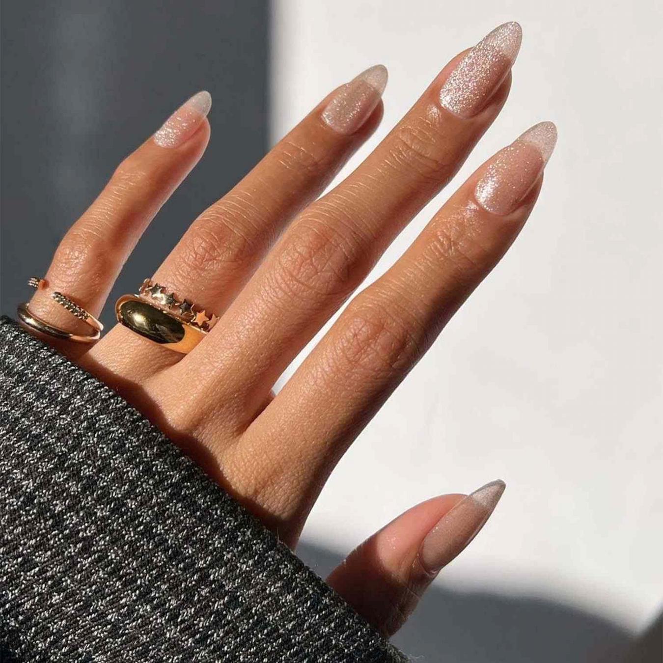 Subtle Silver Glitter Gradient Almonds Subtle Silver Glitter Gradient Almonds — New Years Eve Nails 2027