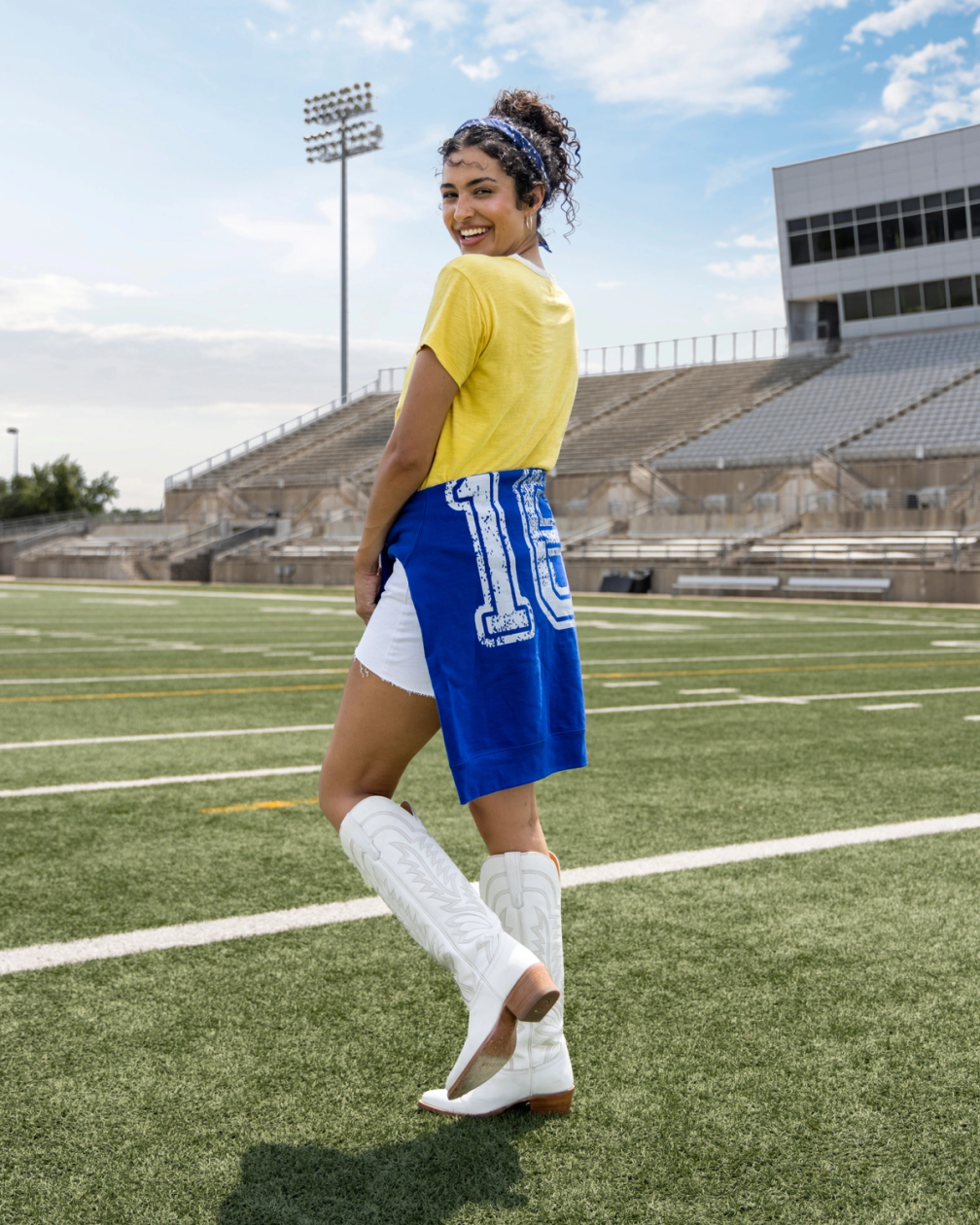 Sporty Casual: Yellow Tee with Draped Jersey and White Boots — College Game Day Outfits 2026