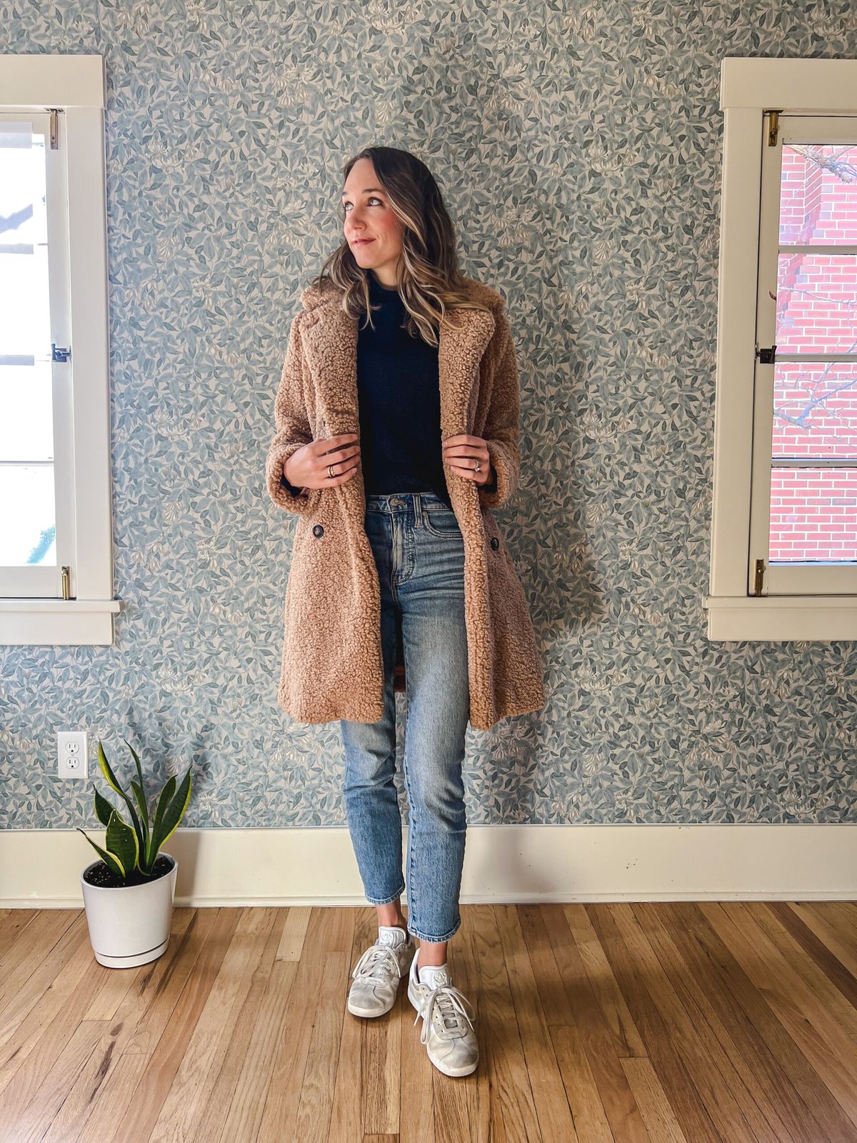 Cozy Beige Teddy Coat with Black Turtleneck and Blue Jeans Cozy Beige Teddy Coat with Black Turtleneck and Blue Jeans — Winter Outfits Warm Climate 2027