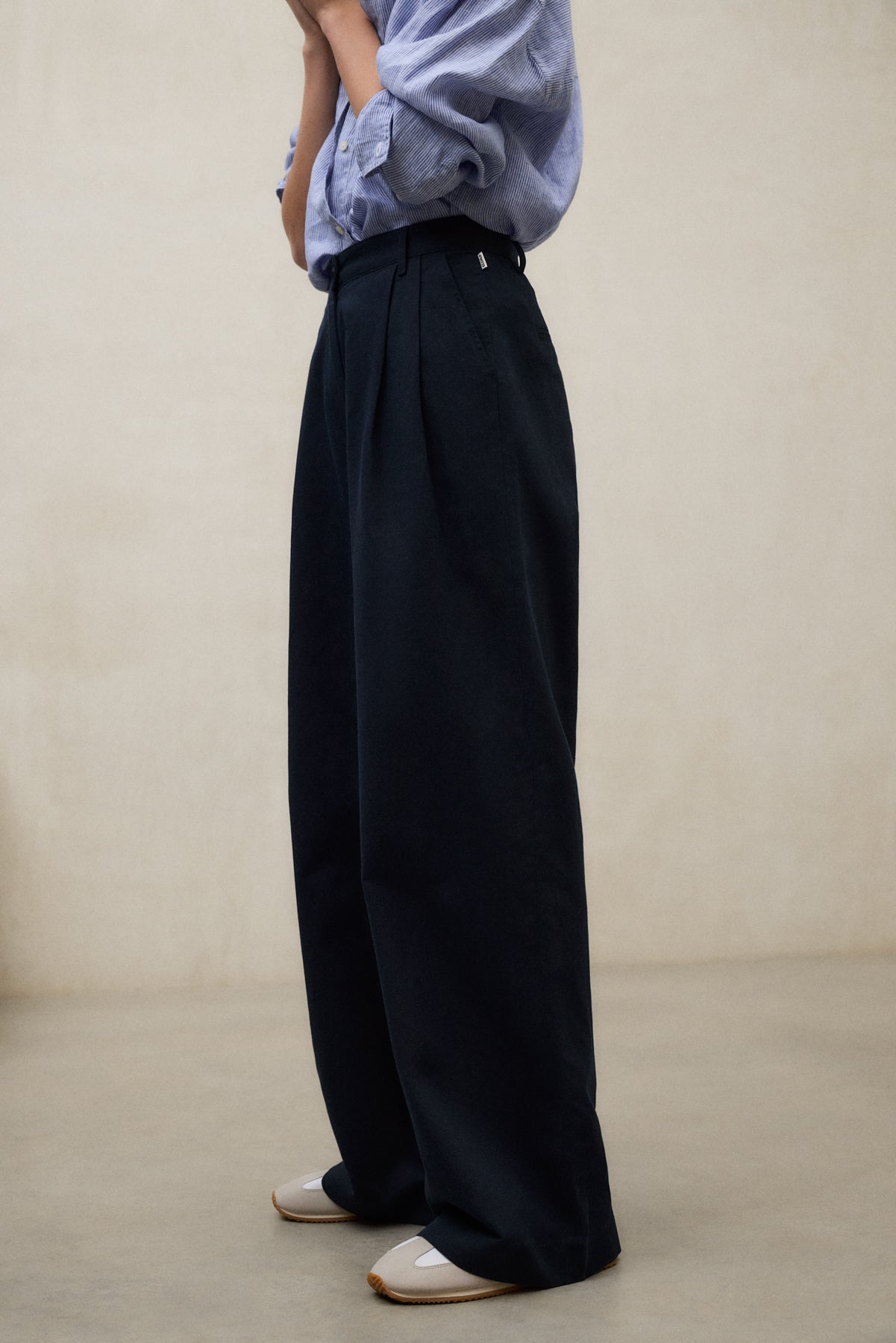 Light Colored Slip-On Shoes Outfit Idea — Navy Blue Linen Pants Outfits 2027
