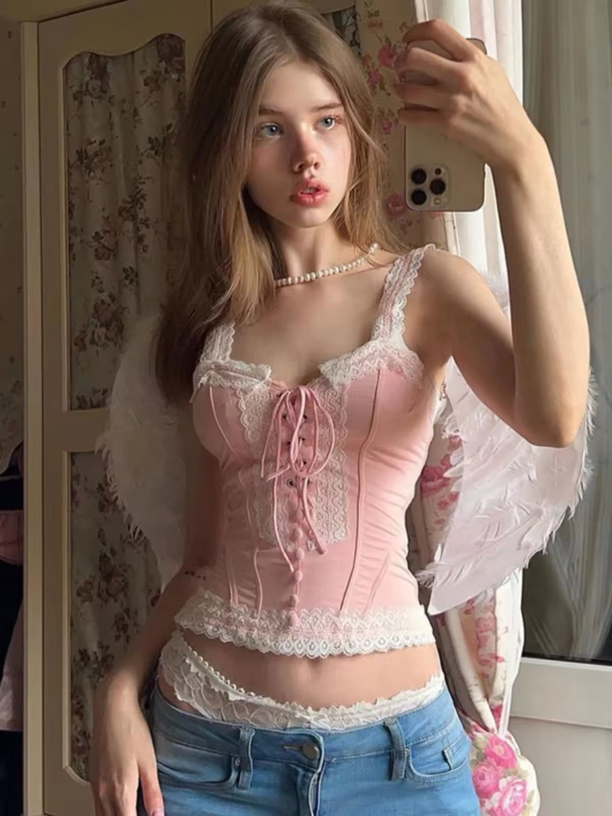Casual Coquette Edge: Pink Lace Corset with Denim and Feather Wings Casual Coquette Edge: Pink Lace Corset with Denim and Feather Wings — Coquette Corset Top Outfits 2027