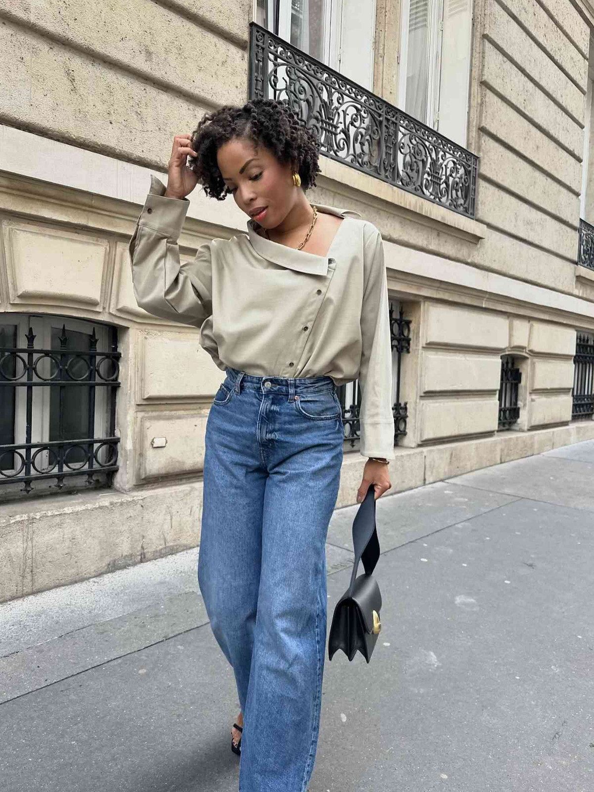 Medium-Wash Bootcut Jeans with an Asymmetrical Blouse — Work Bootcut Jeans Outfits 2027