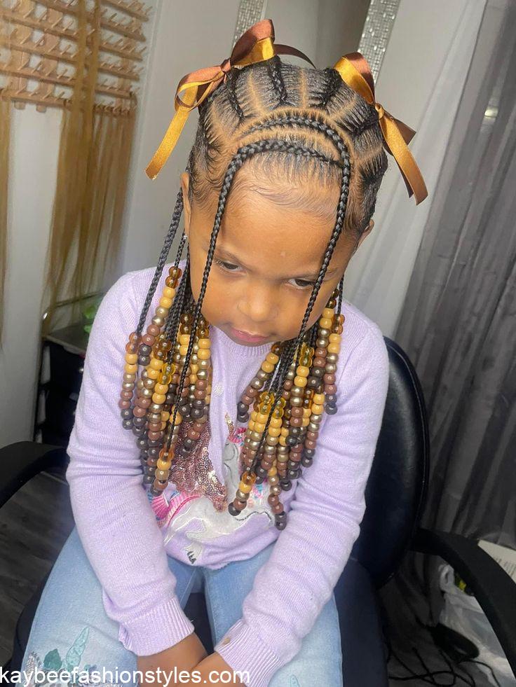 Dark Brown Pigtails with Decorative Balls Dark Brown Pigtails with Decorative Balls — Easter Hairstyles 2027