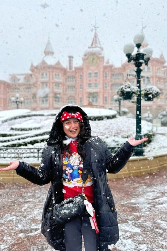 Black Puffer Coat with a Bold Red Graphic Tee — Disney Winter Outfits 2027