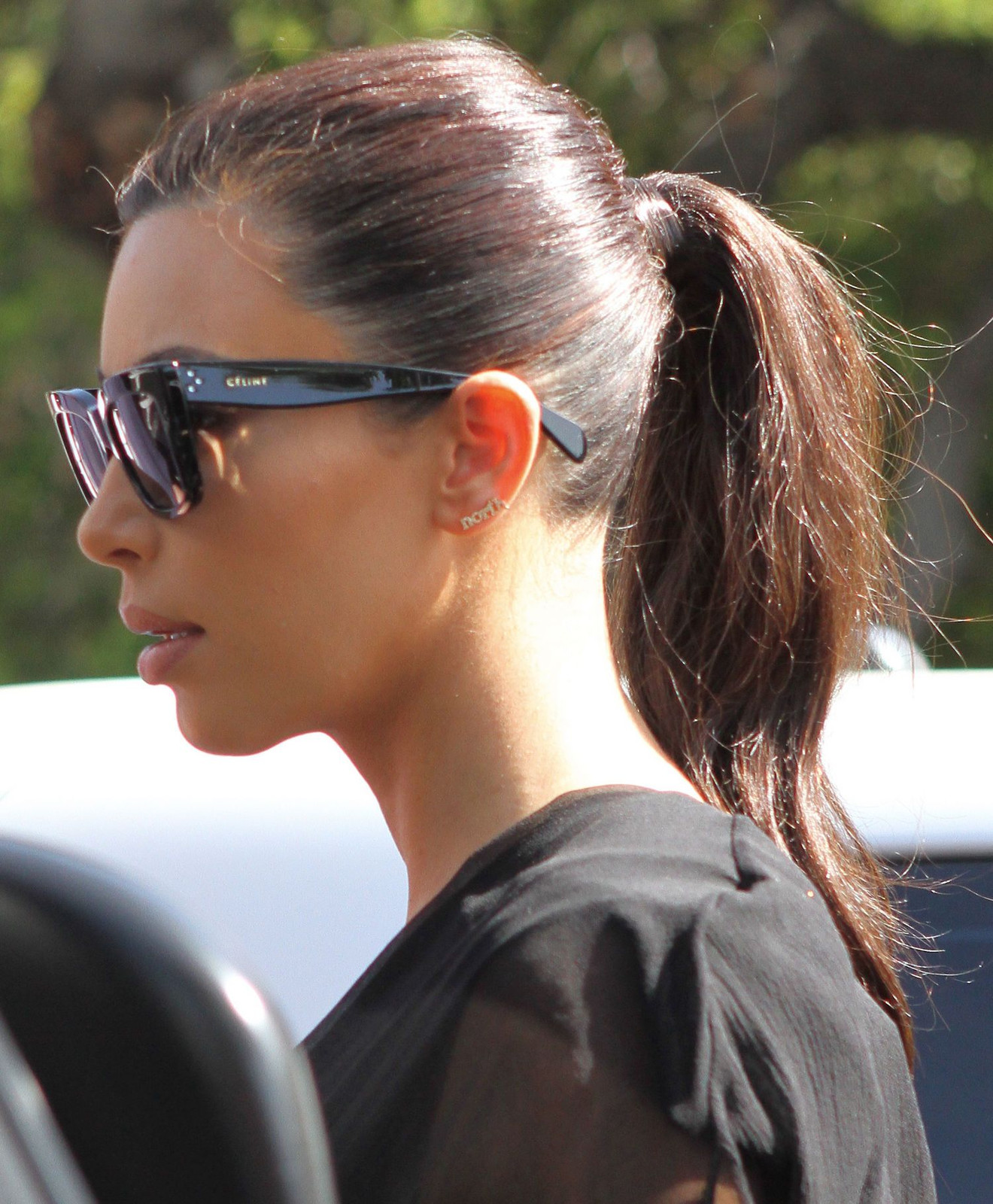 Sleek Mid-Back Dark Brown Ponytail Sleek Mid-Back Dark Brown Ponytail — Ponytail Hairstyles 2027 with Glasses