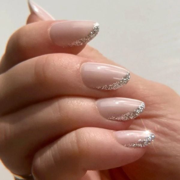 Neutral Festive Sheer Pink Glitter French Short Oval Nails Neutral Festive Sheer Pink Glitter French Short Oval Nails — Neutral Christmas Nails 2026