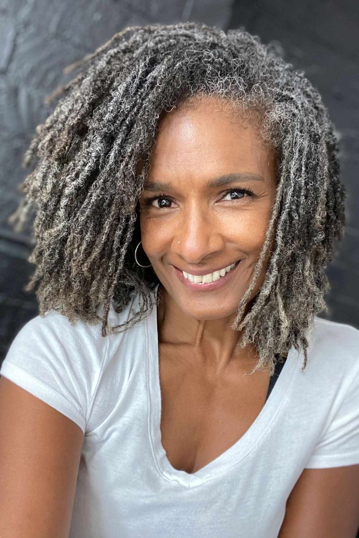 Collarbone Sister Locs in Salt and Pepper Collarbone Sister Locs in Salt and Pepper — Loc Styles 2027 for Women Over 50