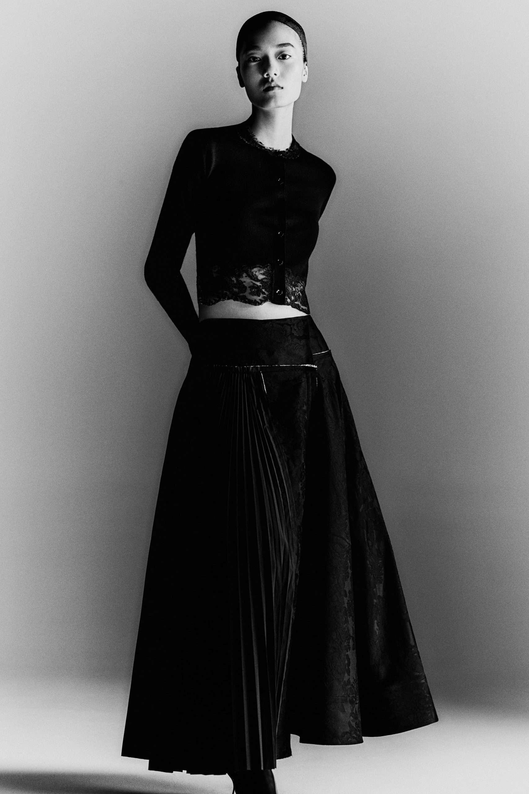 Full Black Pleated Skirt with Lace Trim Cardigan and Crop Top — Pleated Skirt Outfits 2027
