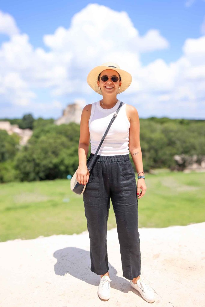 Black Linen Pants with White Tank Top and Straw Hat Black Linen Pants with White Tank Top and Straw Hat — Mexico City Outfits 2027