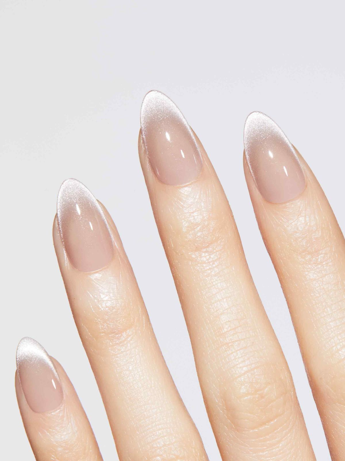Milky Nude Silver Cat Eye Tip Almonds Milky Nude Silver Cat Eye Tip Almonds — Champagne Nails 2027