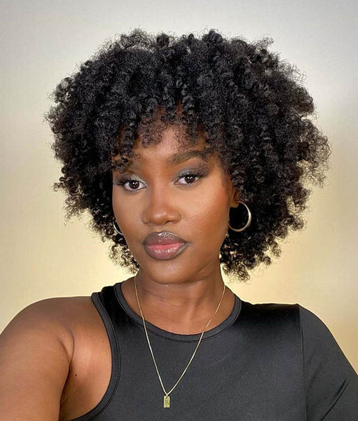 Short Textured Coils with Wispy Bangs Short Textured Coils with Wispy Bangs — Hairstyles 2027 for Black Women