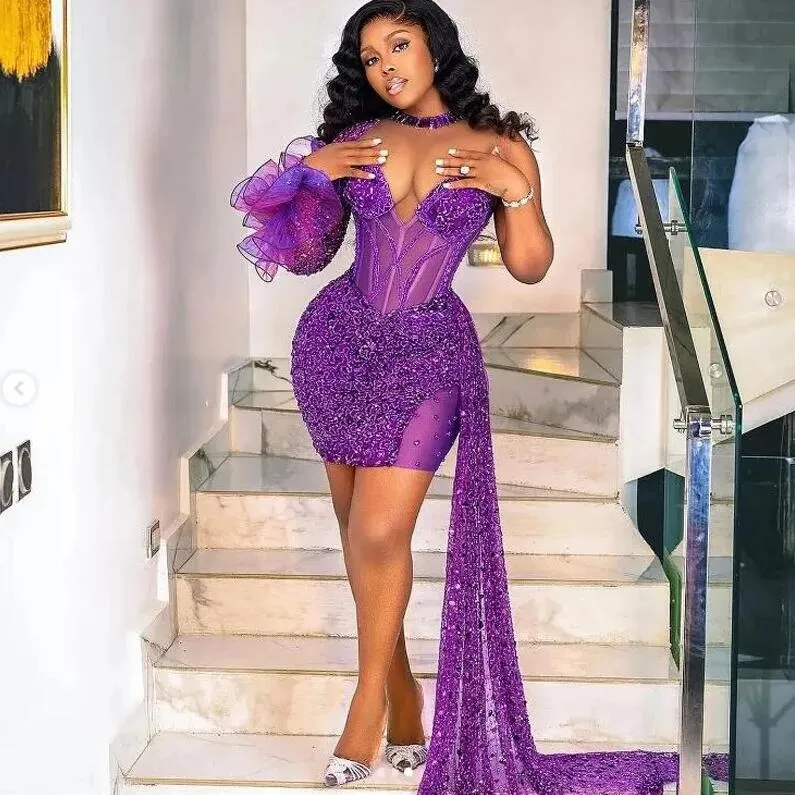 Short Purple Sequin Prom Dress with Sheer Ruffled Sleeves and Train Short Purple Sequin Prom Dress with Sheer Ruffled Sleeves and Train — Purple Prom Dresses 2027
