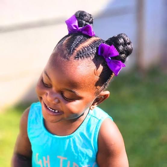 Coily Double Buns With Purple Bows — Ribbons Little Girl Hairstyles 2027