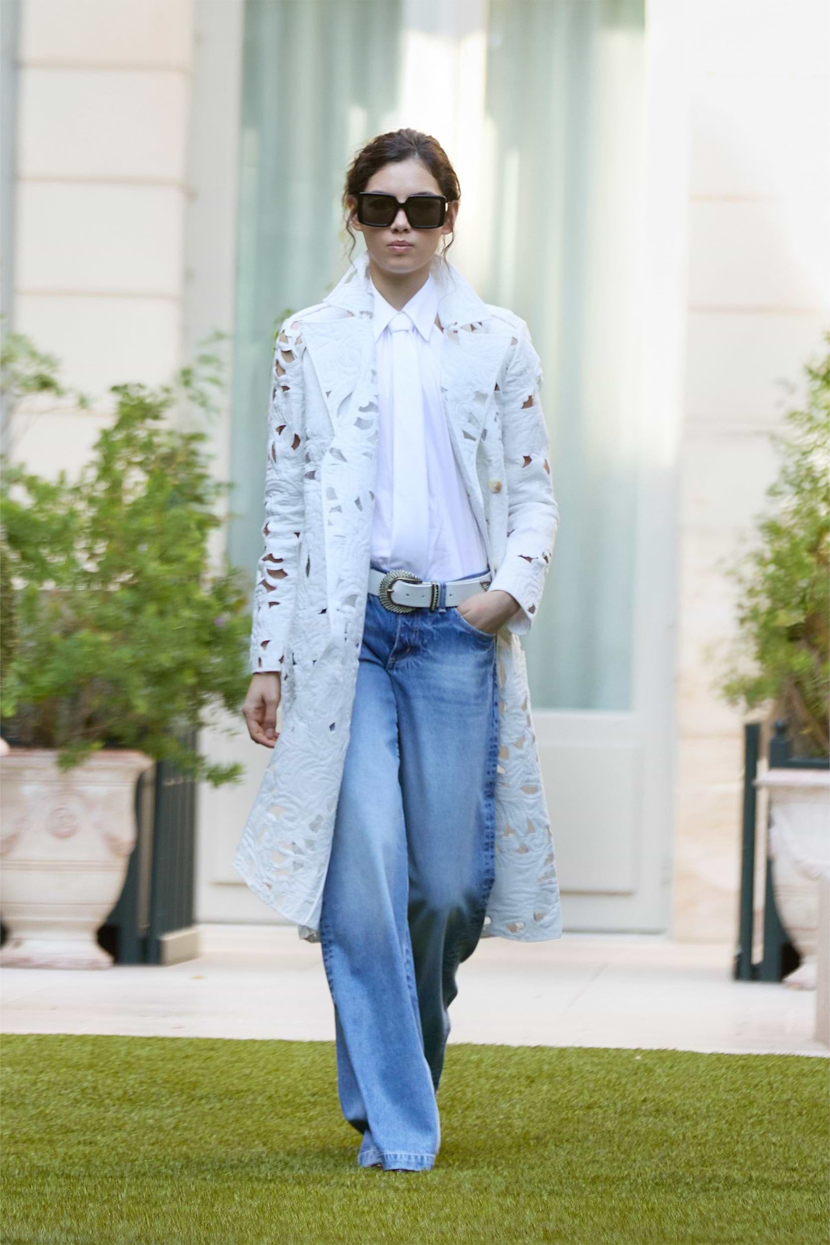 Light Wash Jeans Paired with a White Cut-Out Cropped Jacket Light Wash Jeans Paired with a White Cut-Out Cropped Jacket — Spring Outfits 2027 with Jeans