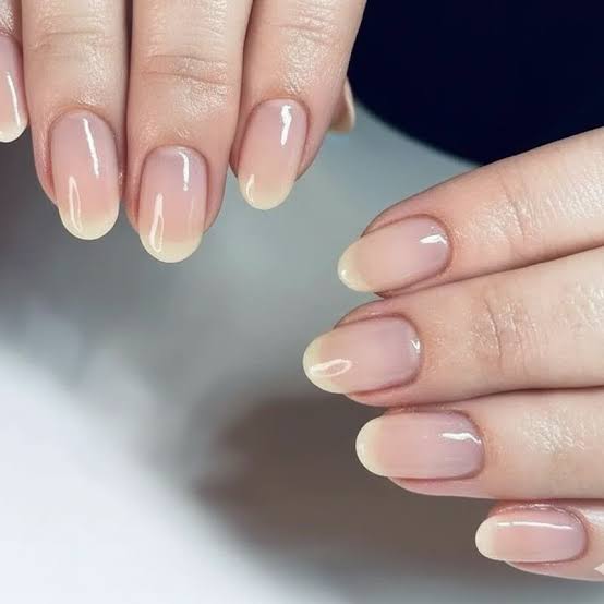 Both Hands Close Up Sheer Nude Pink Glossy Short Oval Both Hands Close Up Sheer Nude Pink Glossy Short Oval — Nurse Nails 2027
