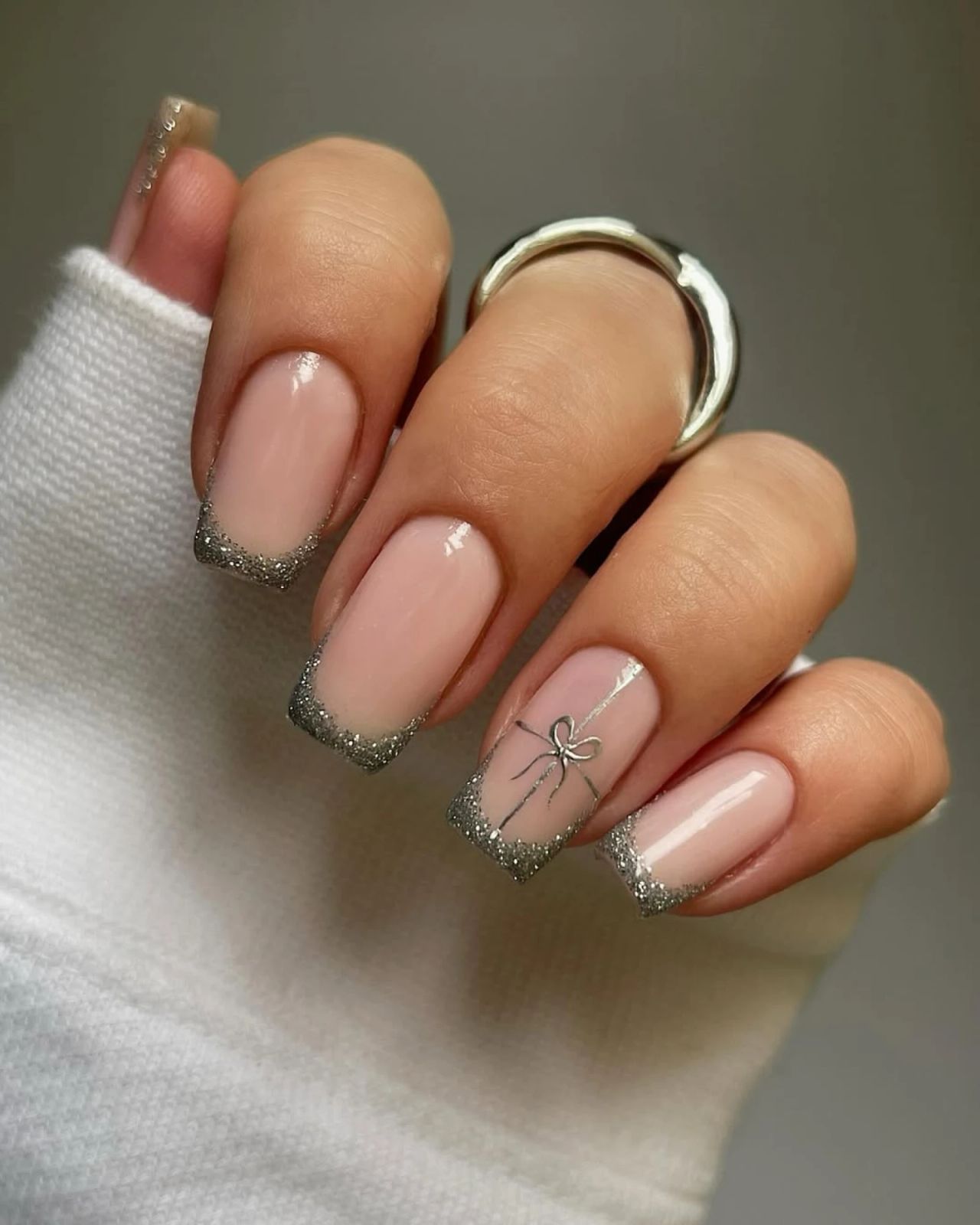 Silver Glitter French Tips with Bow Art Silver Glitter French Tips with Bow Art — Realtor Nails 2027