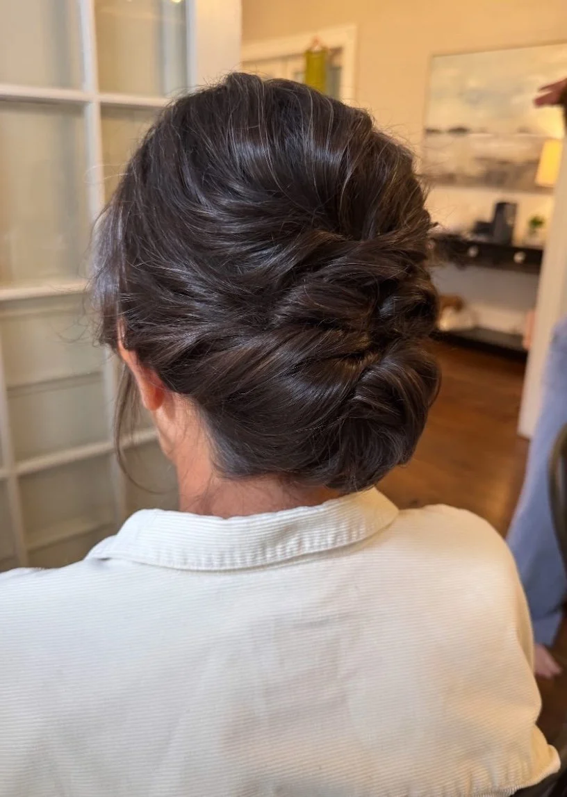 Textured Dark Brown Low Bun Textured Dark Brown Low Bun — Mother of the Bride Updos 2027