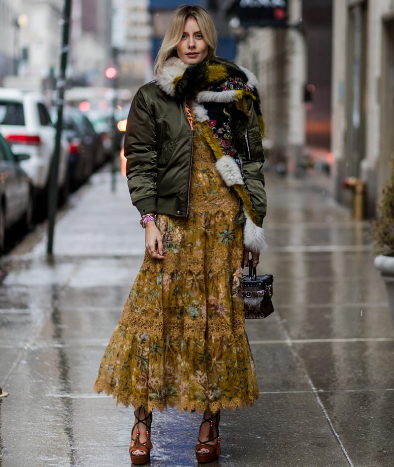 Olive Bomber Jacket Over Floral Maxi Dress with Faux Fur Scarf — Dressy Winter Outfits 2027