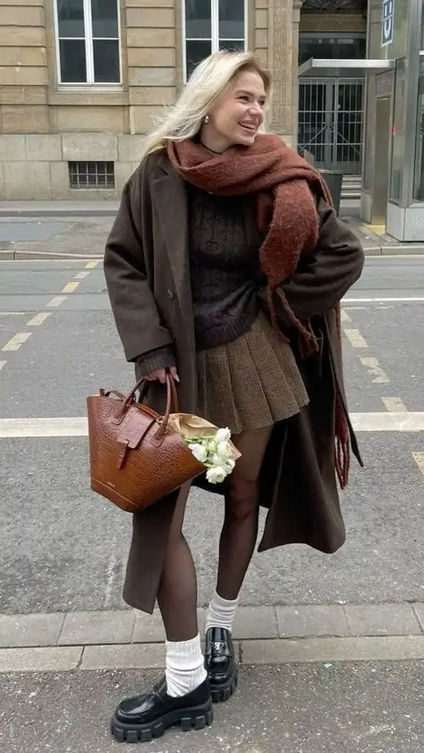 Cozy Layers: Oversized Coat Meets Pleated Mini Skirt Cozy Layers: Oversized Coat Meets Pleated Mini Skirt — TikTok Outfits 2027