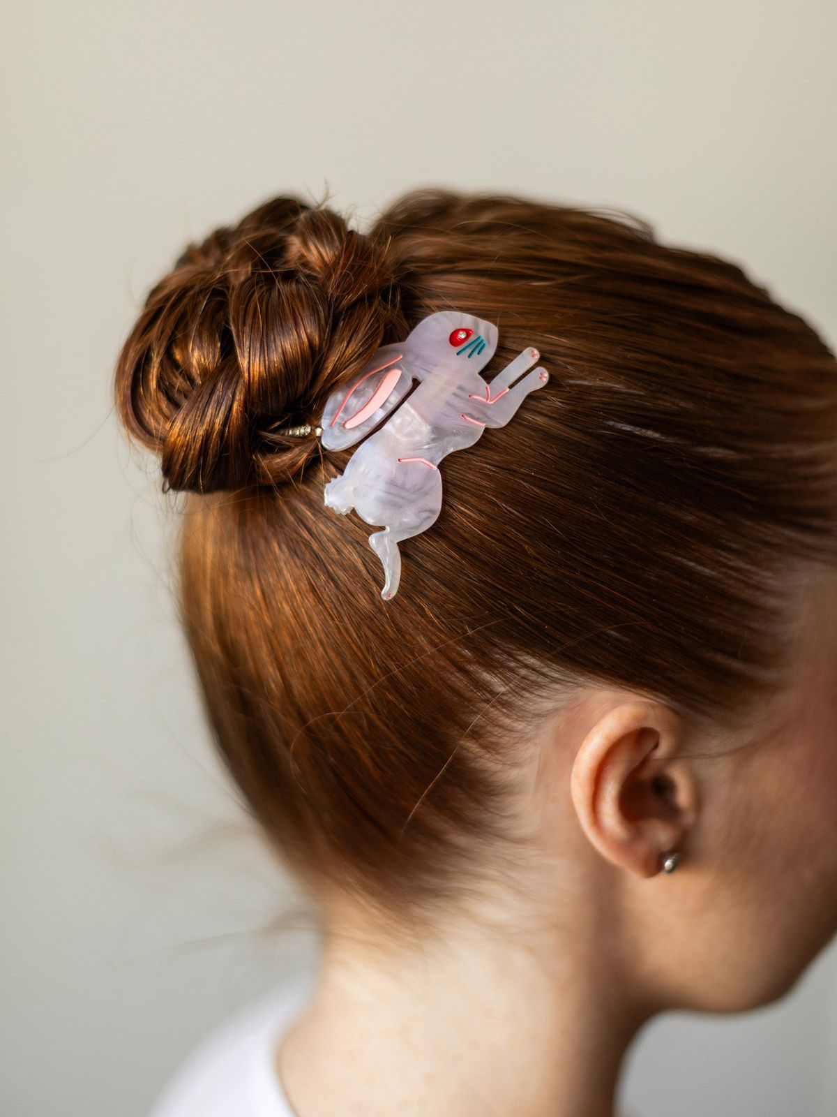 Bunny Barrette on Sleek Auburn Updo — Barrette Hairstyles 2027