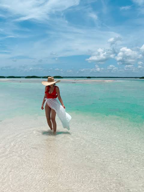 Vibrant Red Bikini with Flowing Sarong and Wedges — Cancun Outfits 2027